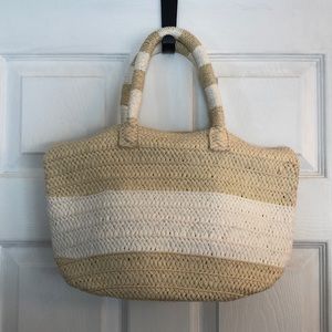 Altru woven handbag with blue tassel and dust bag